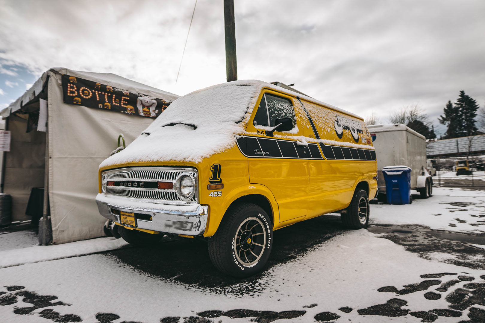 custom yellow yamaha themed dodge van at motorcycle show portland